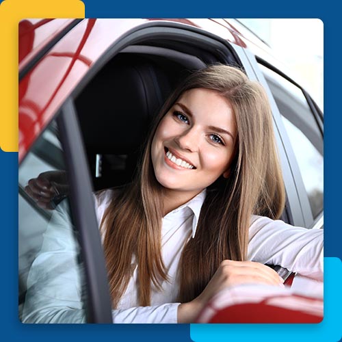 Woman smiling in a car